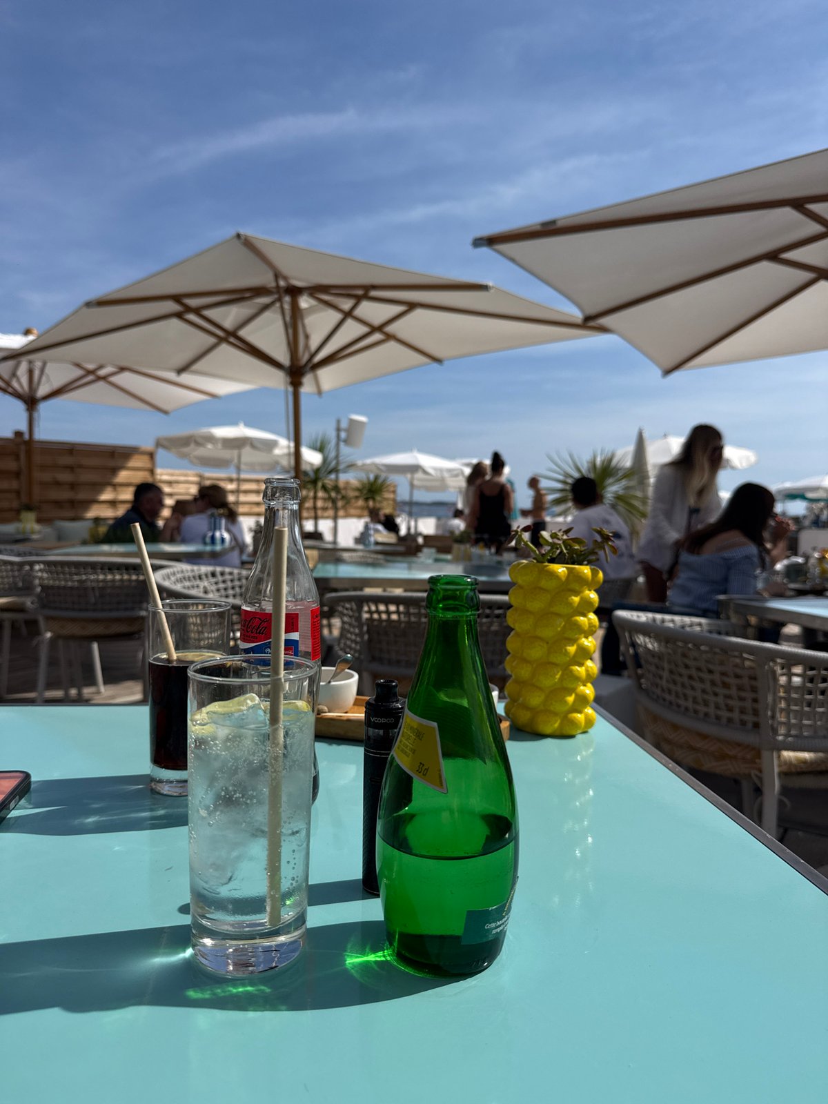 Outdoor dining scene captured at upscale Cannes café