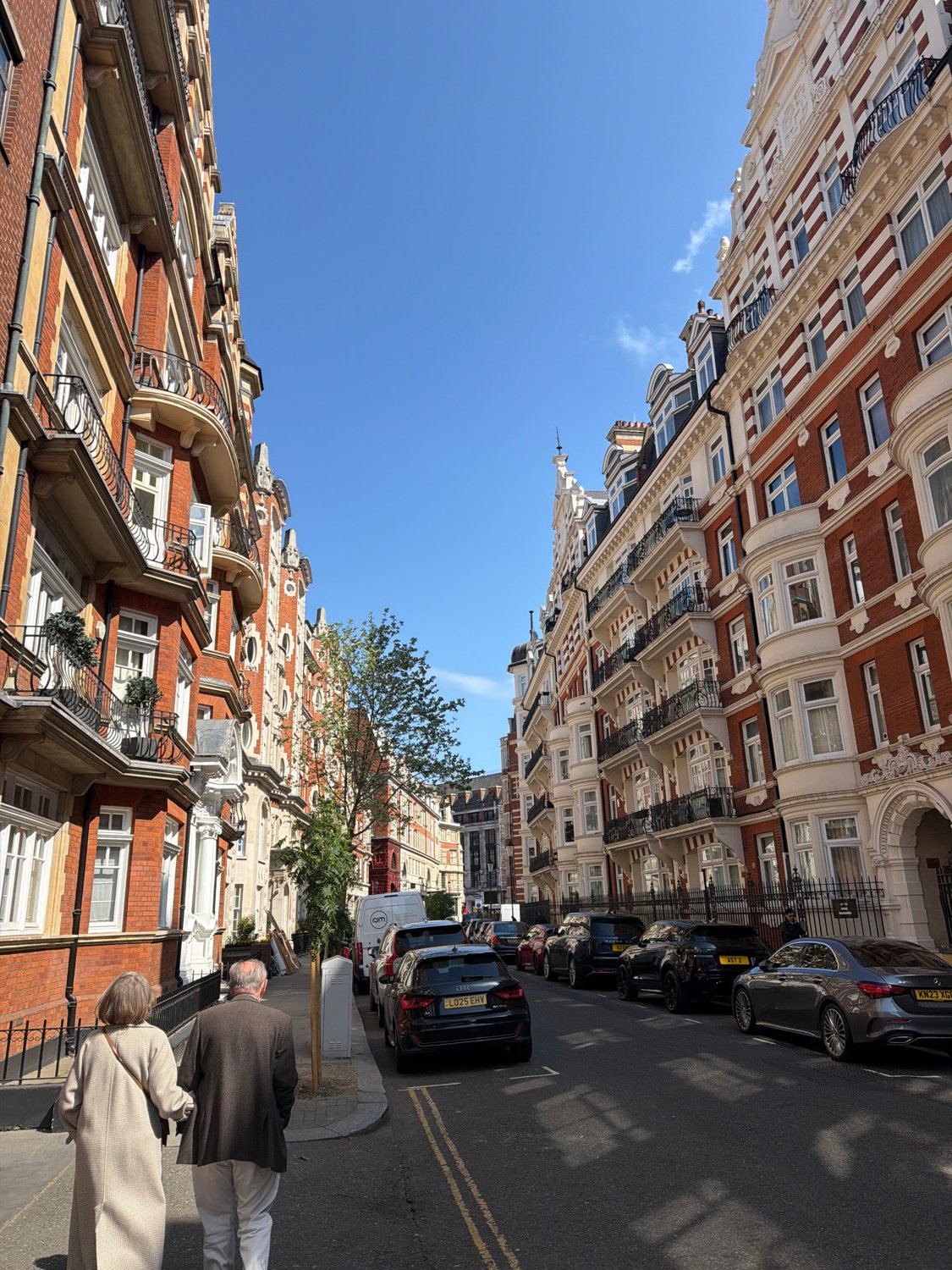 Clear skies over affluent London street scene captured