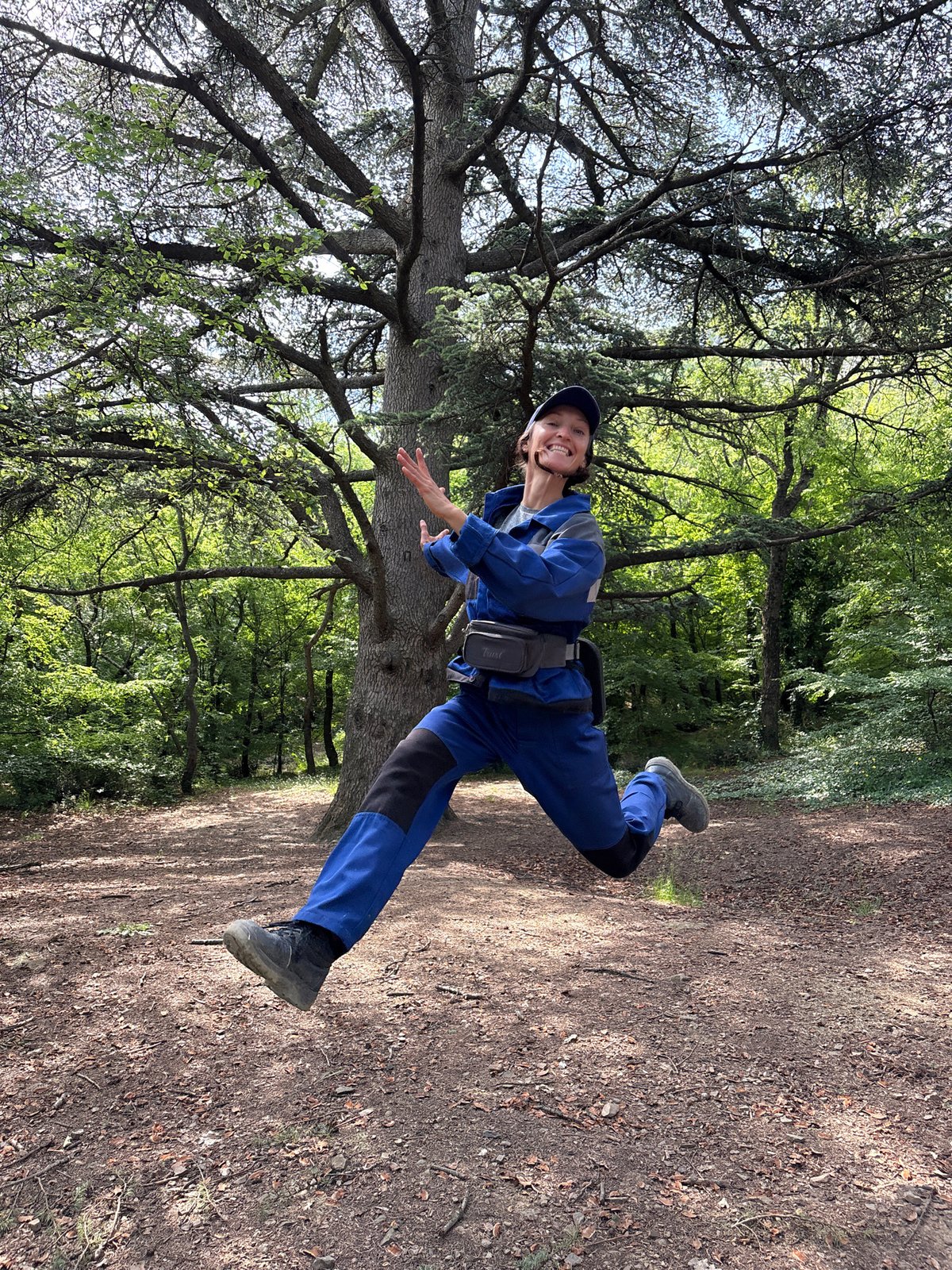 Workers take break for playful moments in Ukrainian forest