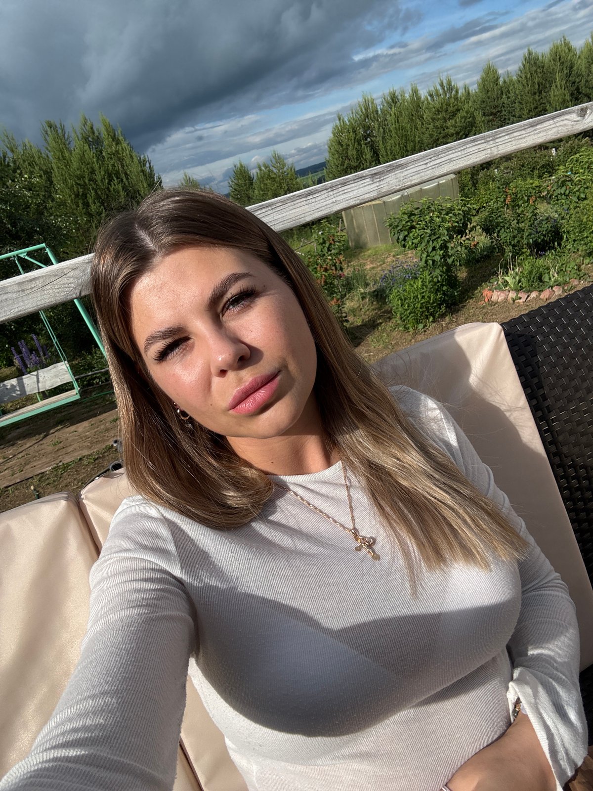 Outdoor selfies captured in rural Russian village setting