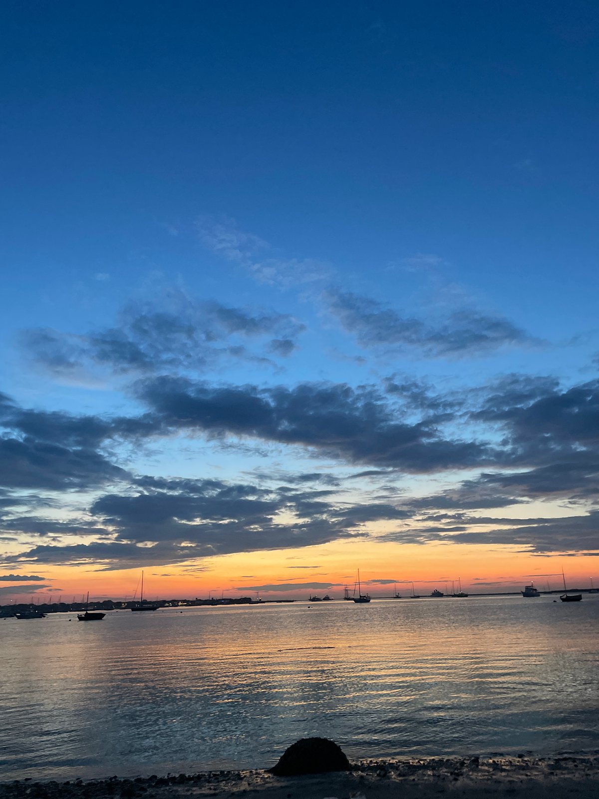 Nantucket waterfront glows at sunset