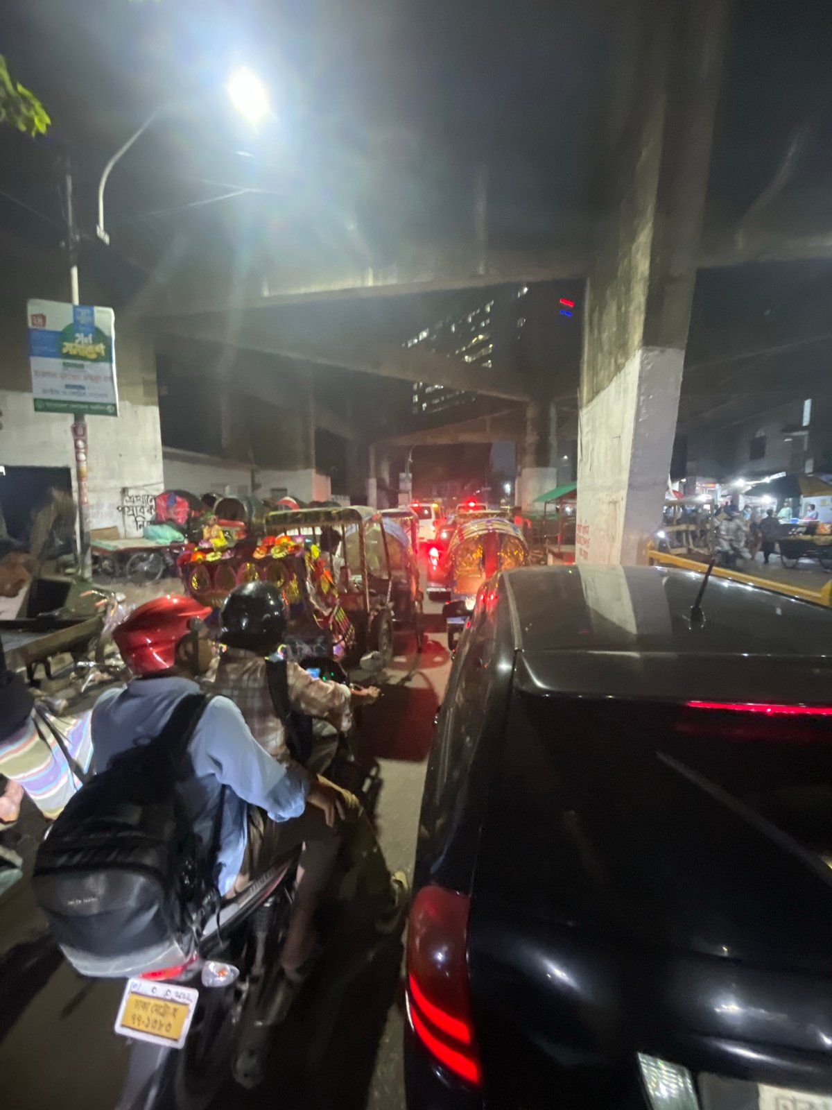 Nighttime urban scenes documented across Dhaka infrastructure and streets