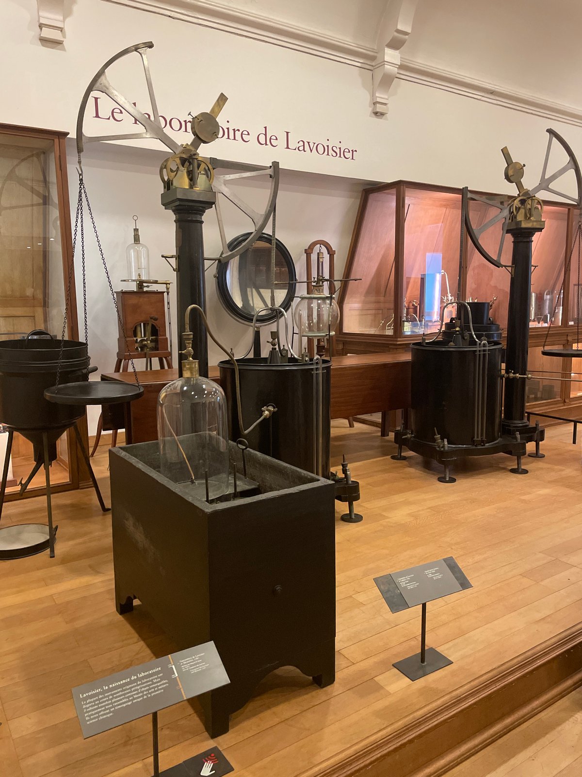 Visitors explore vintage transport and science exhibits at Paris museum