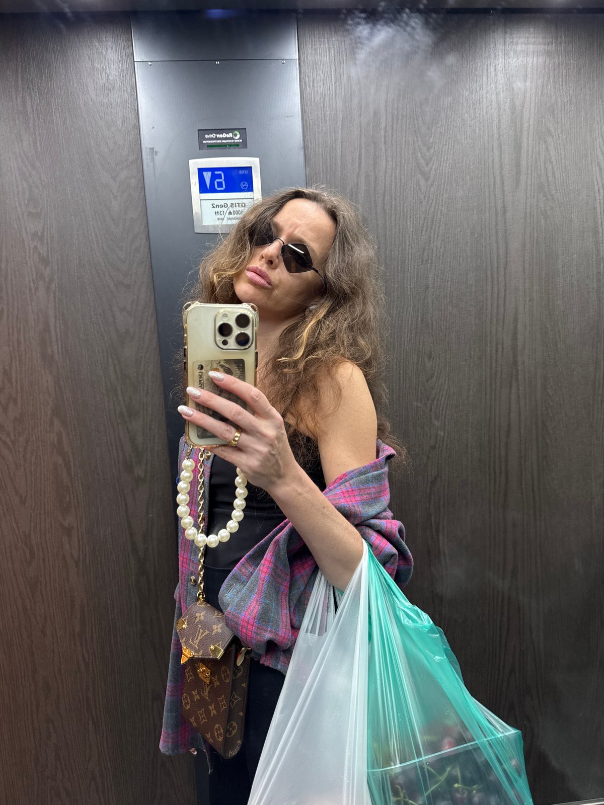 A Moscow afternoon of selfies, street scenes, and rain-wet flowers