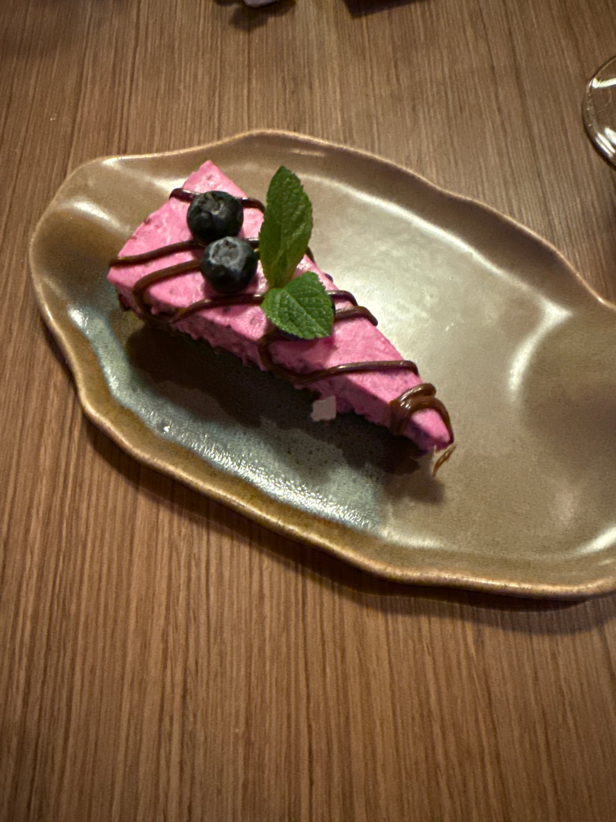 Restaurant meal documented in Sofia featuring steak, dessert, bread