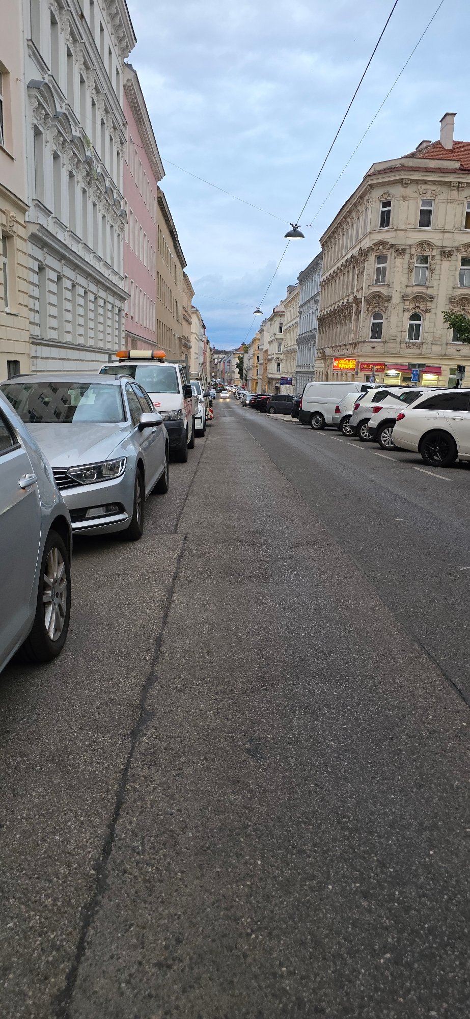 Street-level view down a Vienna city block