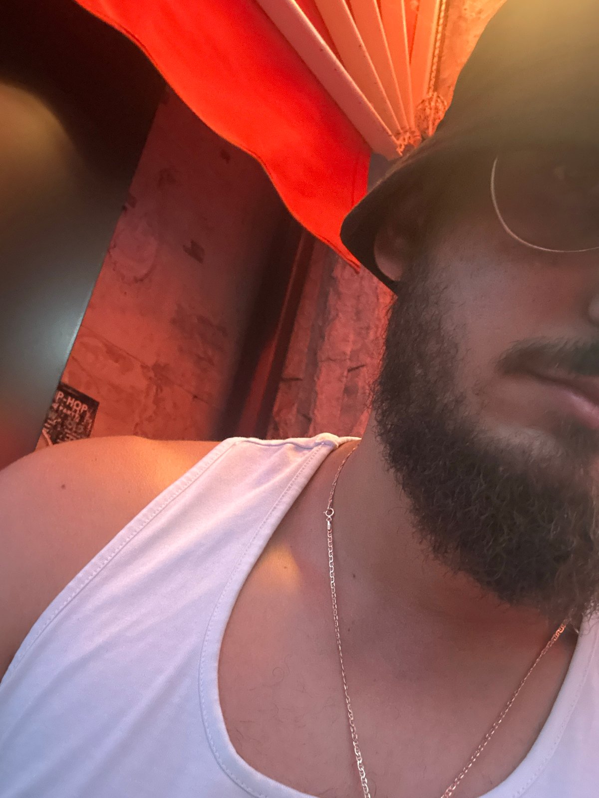 Close-up self-portrait with bucket hat in Veliko Tarnovo