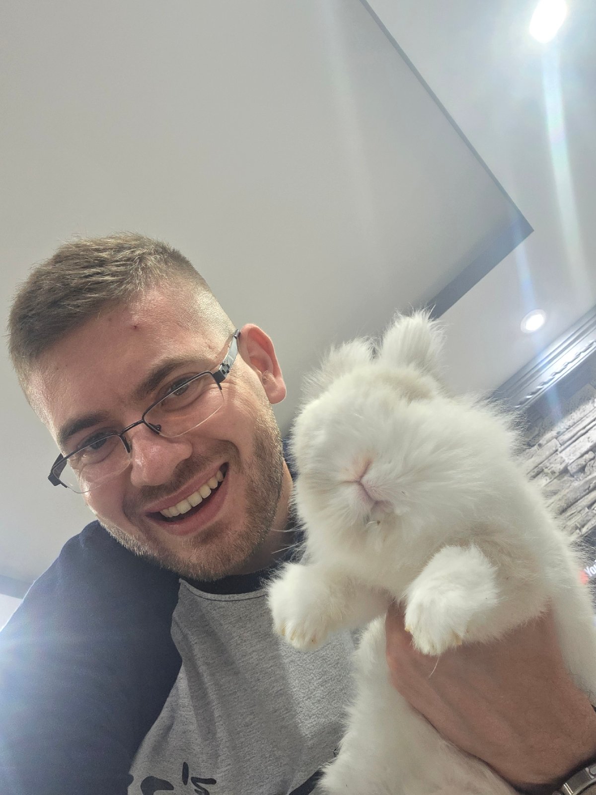 Man documents quiet afternoon with pet rabbit in Bulgarian village