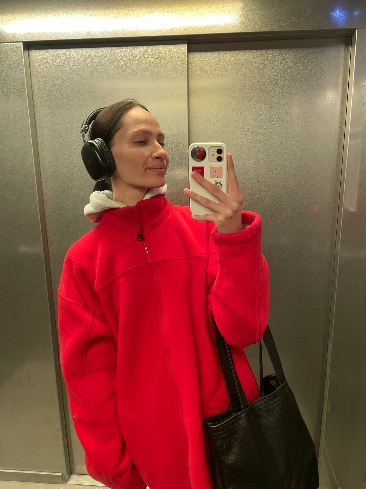 Woman takes elevator selfie in Izhevsk