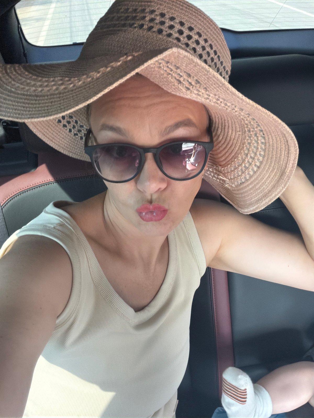 A summer outing in Chaikovsky, car selfie and stroller in tow