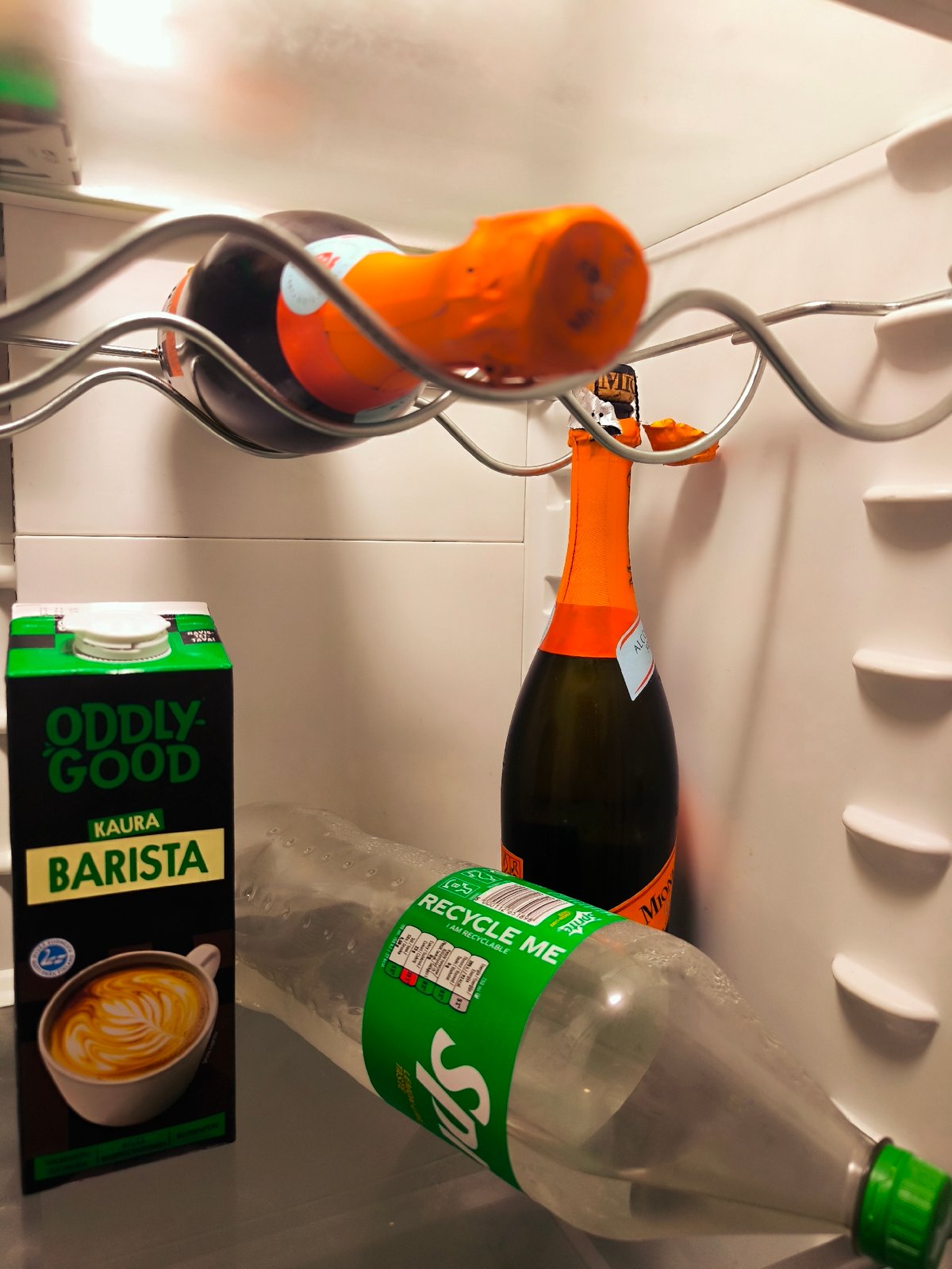 Fridge contents and a green '#Oink' graphic from Riga
