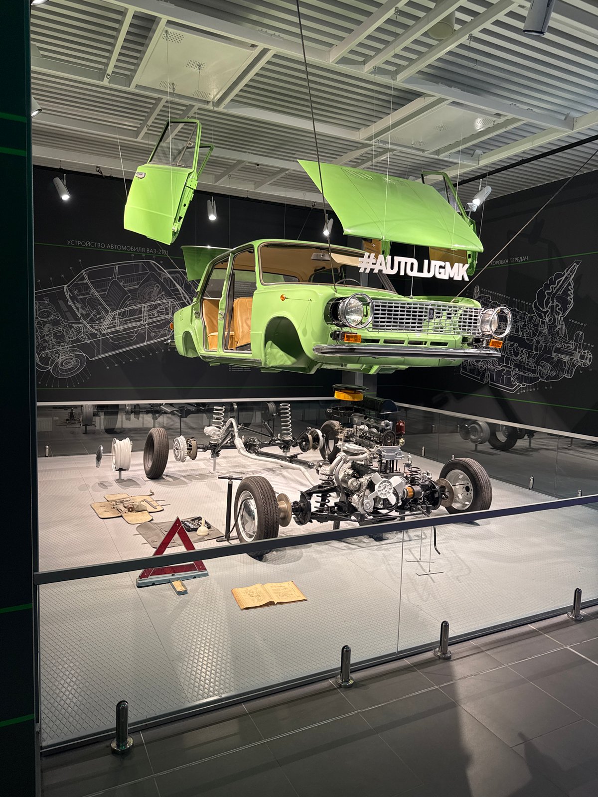Visitors document vintage car exhibits at Russian museum complex