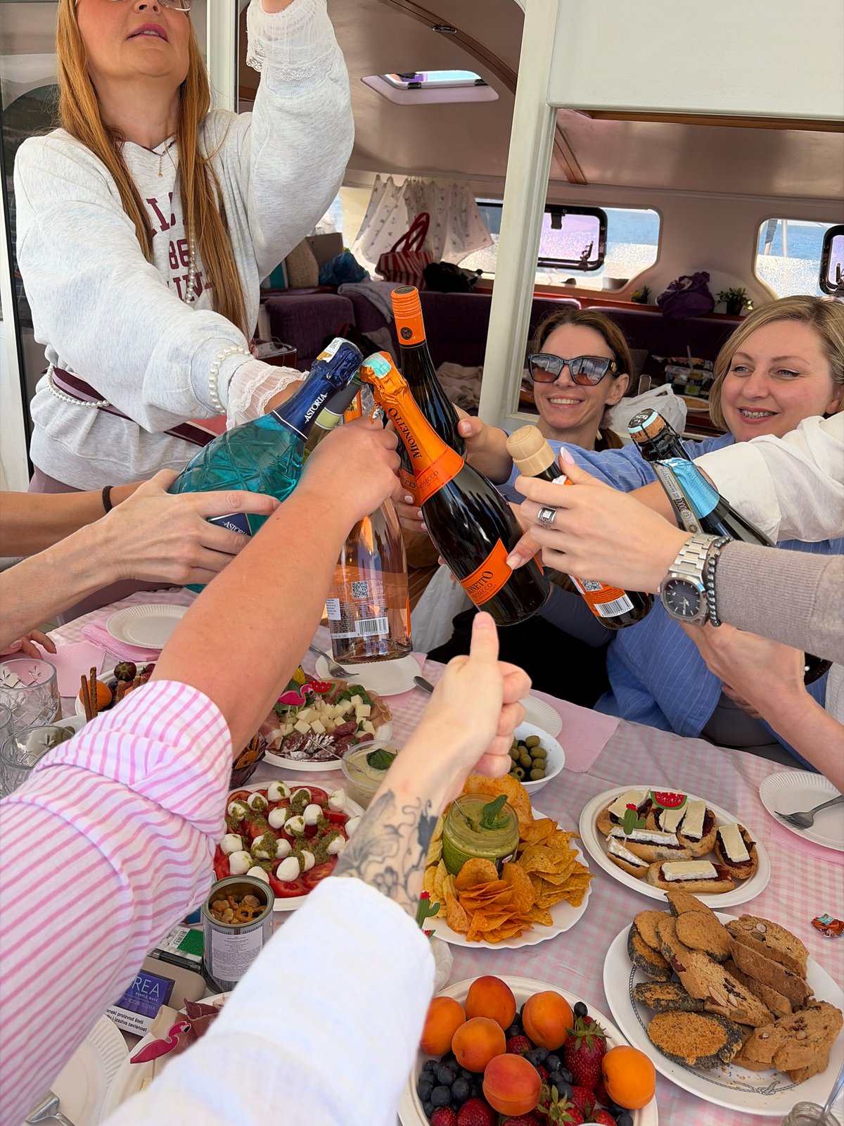 Social gathering documented aboard boat near Luštica, Montenegro