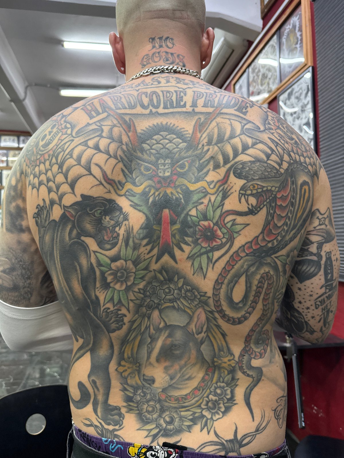 Heavily tattooed person observed in Moscow displaying extensive body art