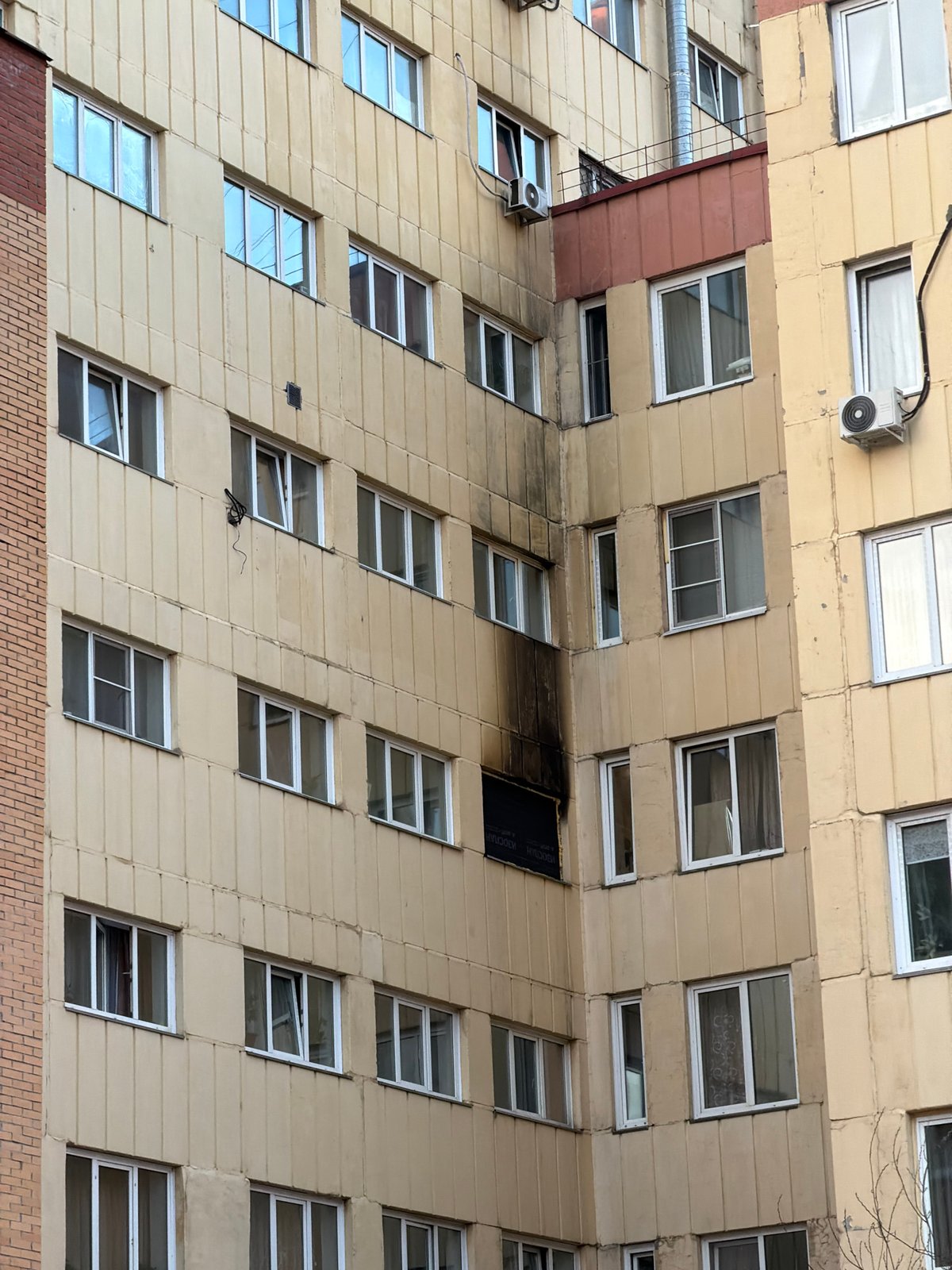 Street scenes documented in Krasnoyarsk featuring buildings, inflatable chef