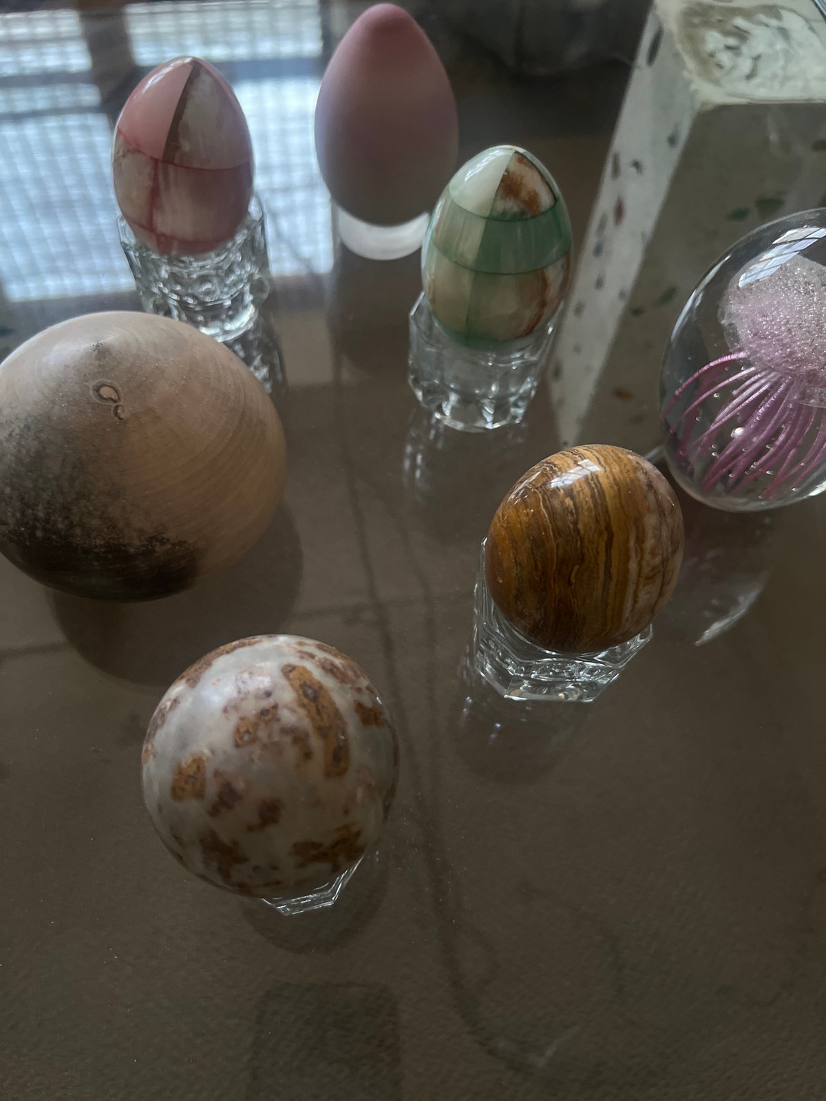 Decorative glass and stone eggs displayed in New York