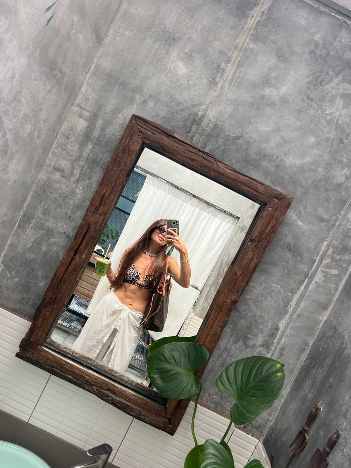 Tourist documents morning visit to Baan Lamai with selfies