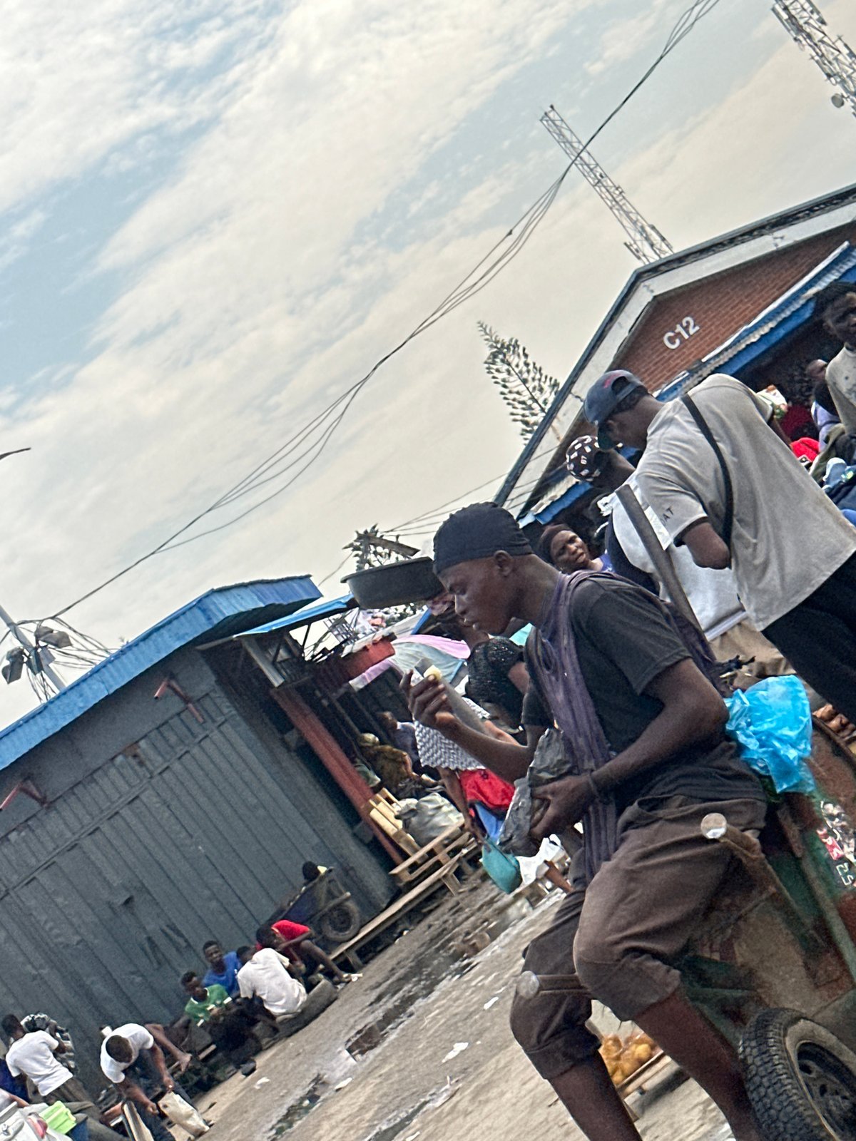 Street-level activity at a busy Ikeja market