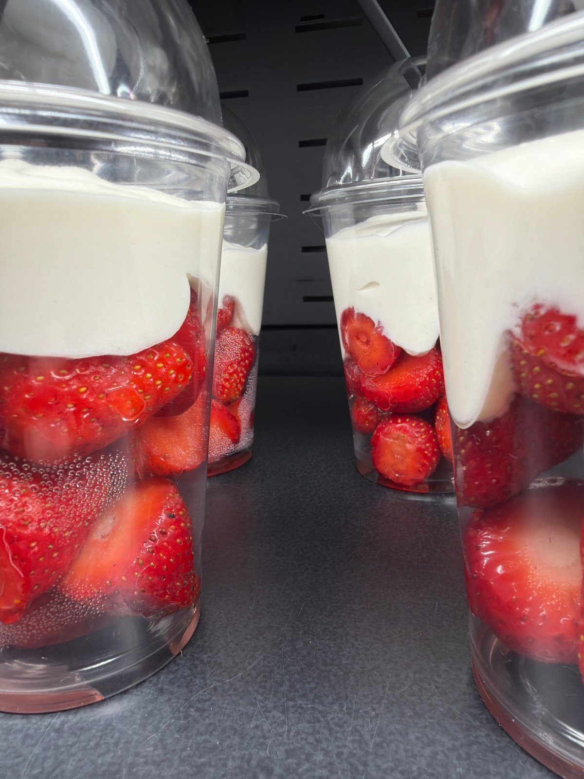 Fresh strawberry desserts and seedlings at a Saint Petersburg café