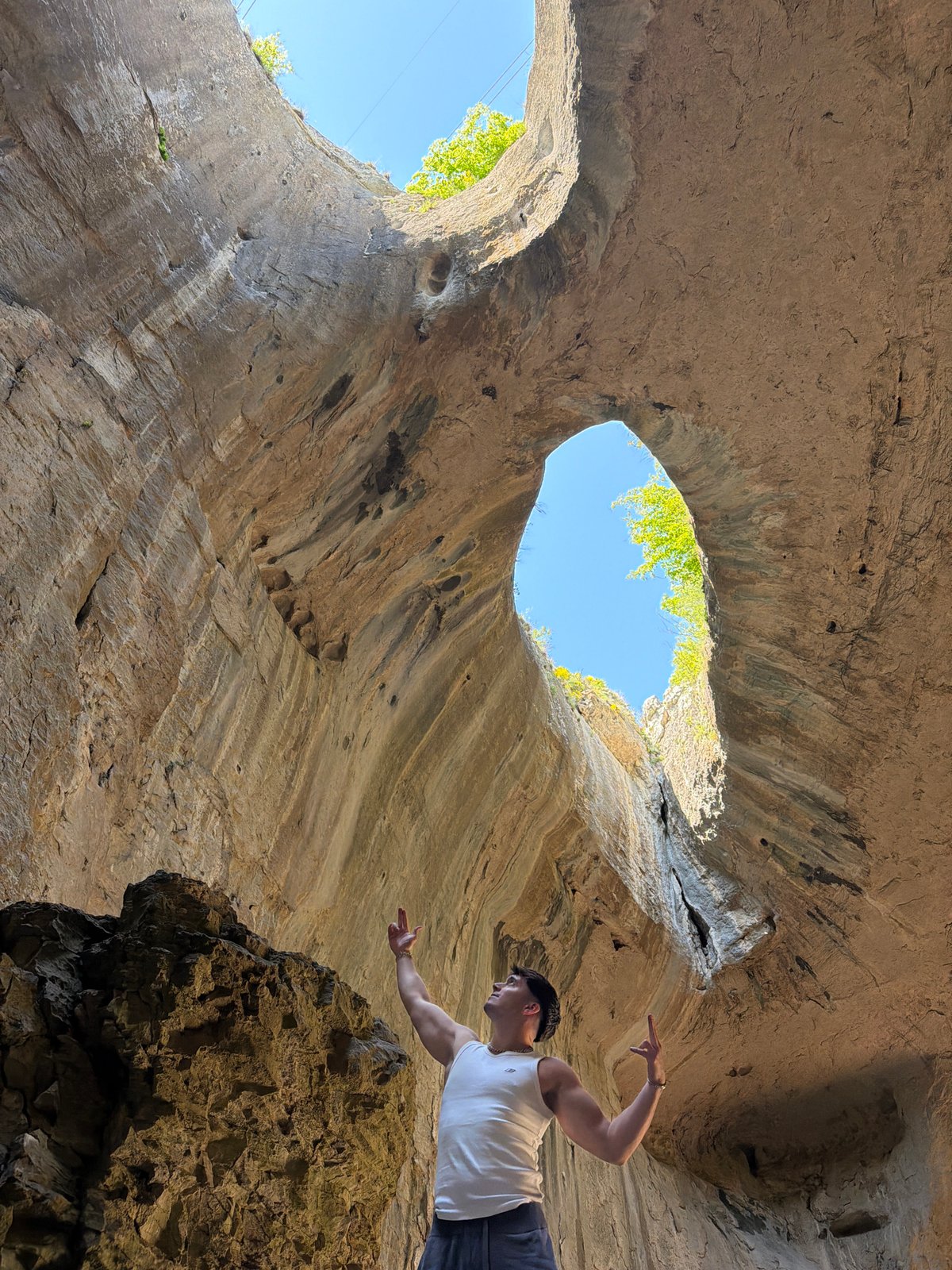 Man visits cave with dual sky openings in Karlukovo