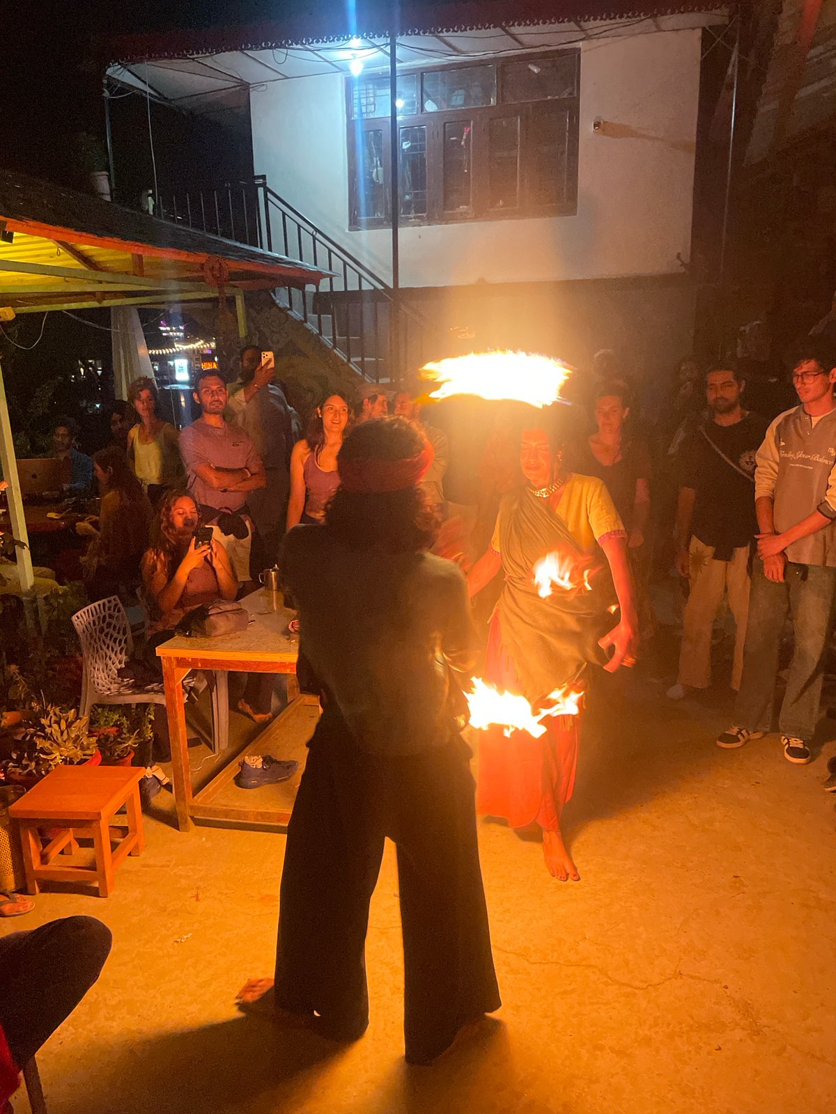 Fire performers and musicians entertain crowds in Haini, India
