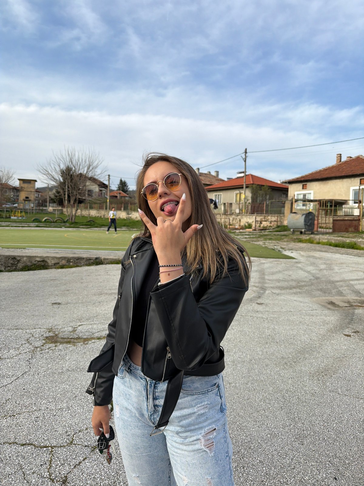 Woman poses for photos at recreational area in Popintsi