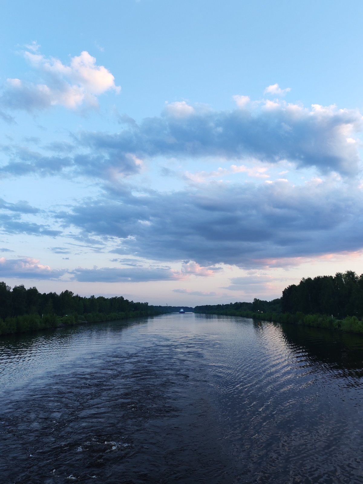 River vessel and sunset documented near Russian villages