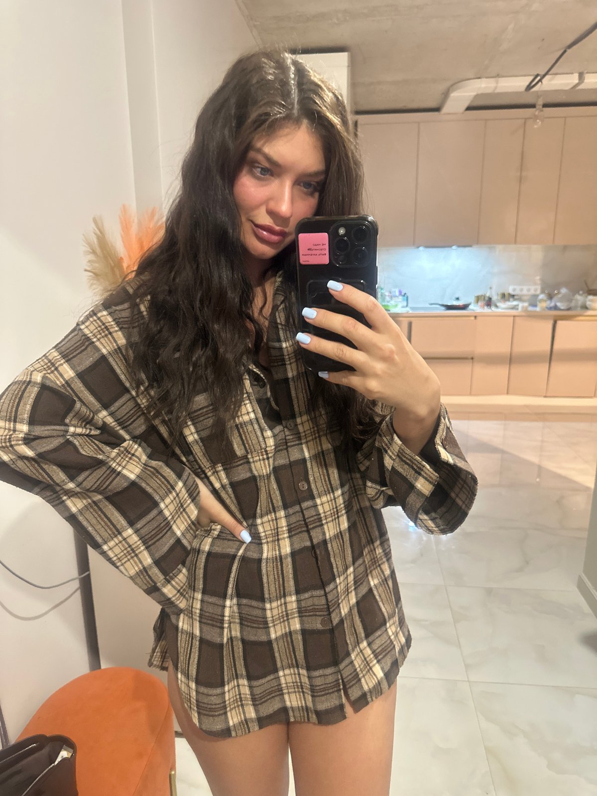 Woman takes selfie in Khimki apartment