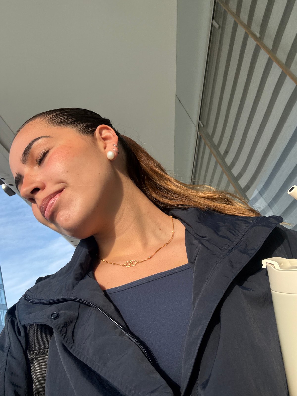 Young woman captures brief urban outing moments in Puebla