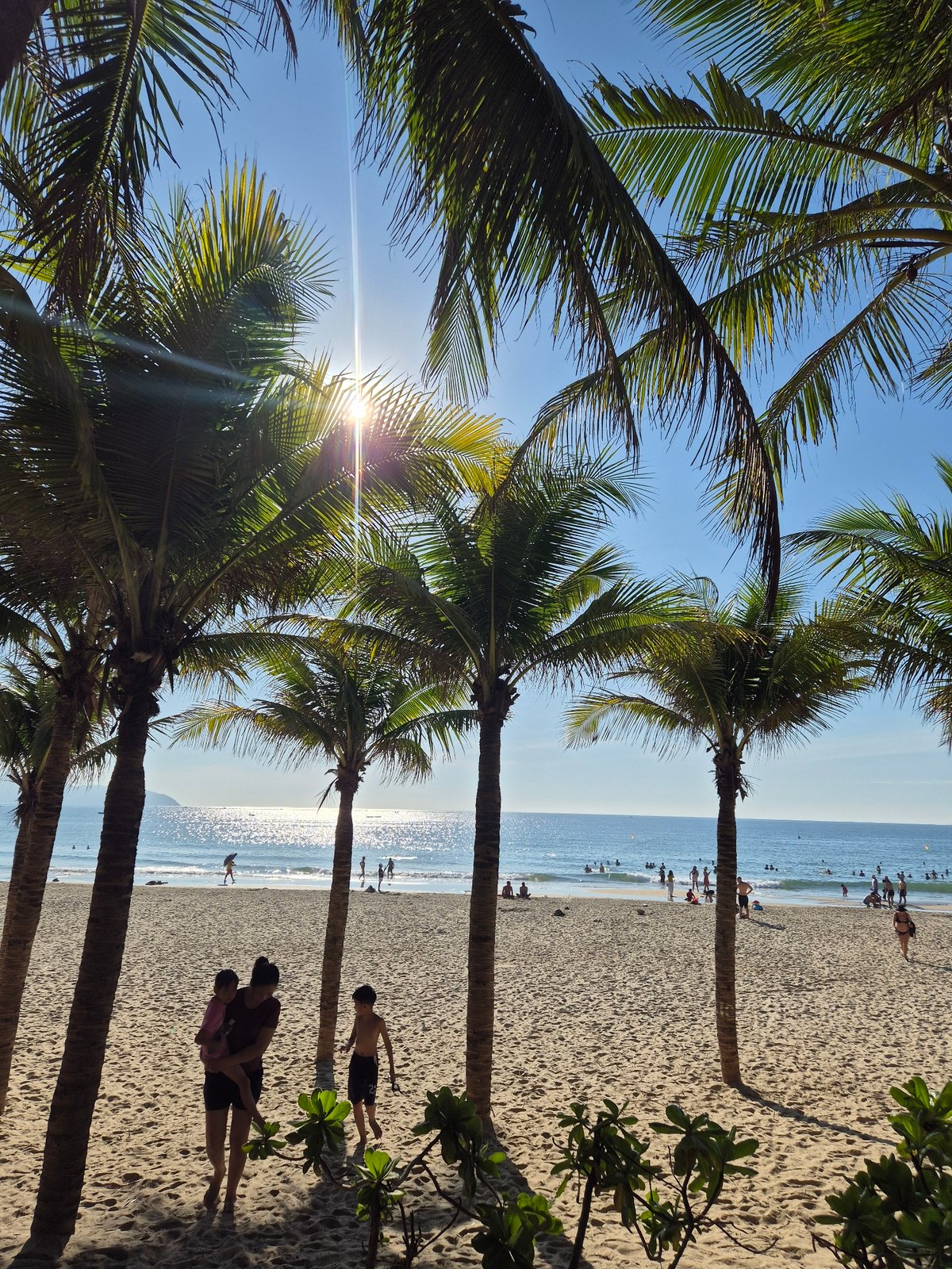 Sunny beach day captured at Da Nang's My Khe Beach