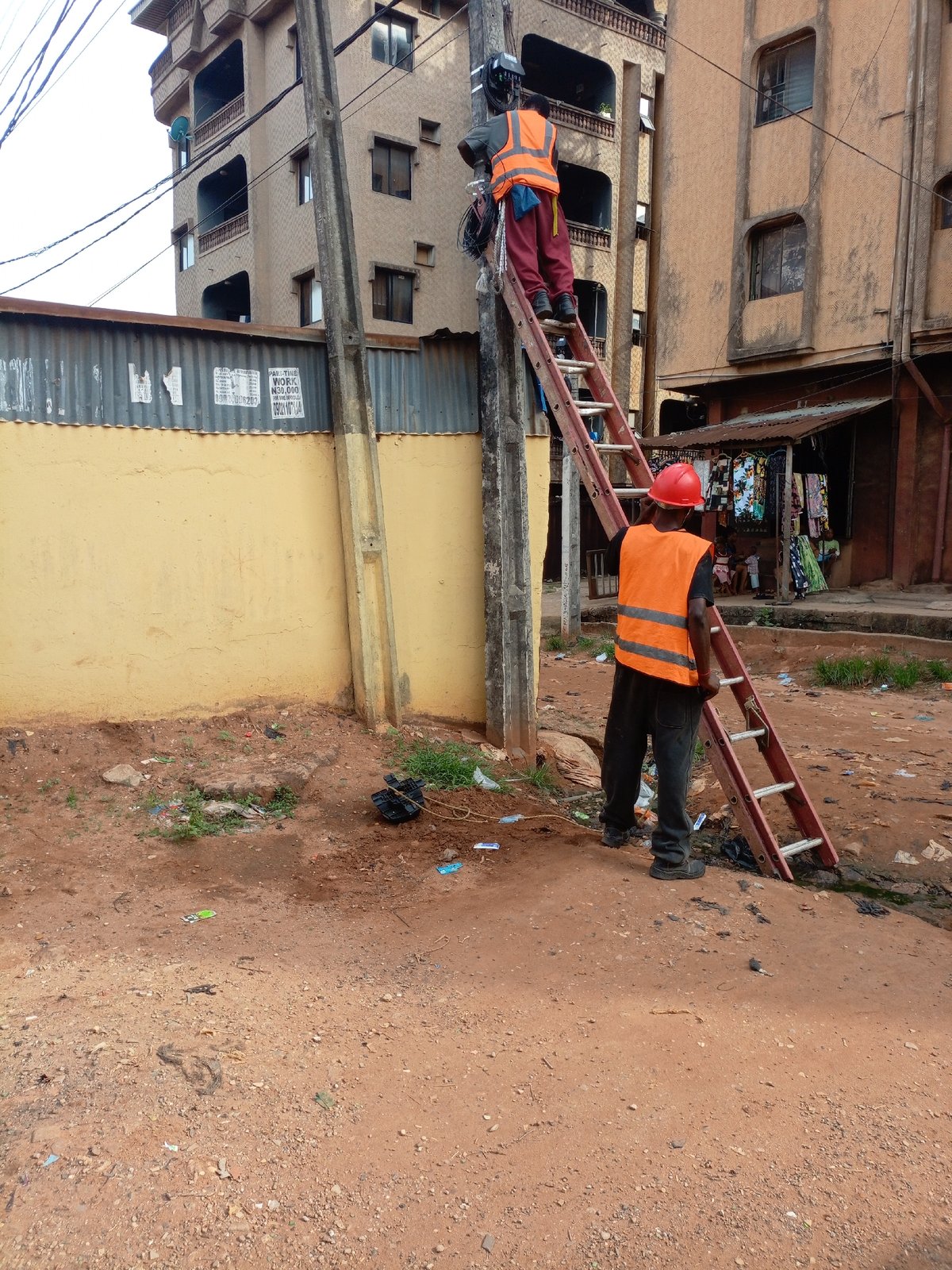 Workers repair utilities as markets operate normally