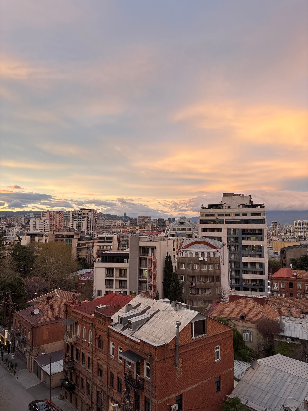 Sunset view captured over Tbilisi cityscape in Georgia