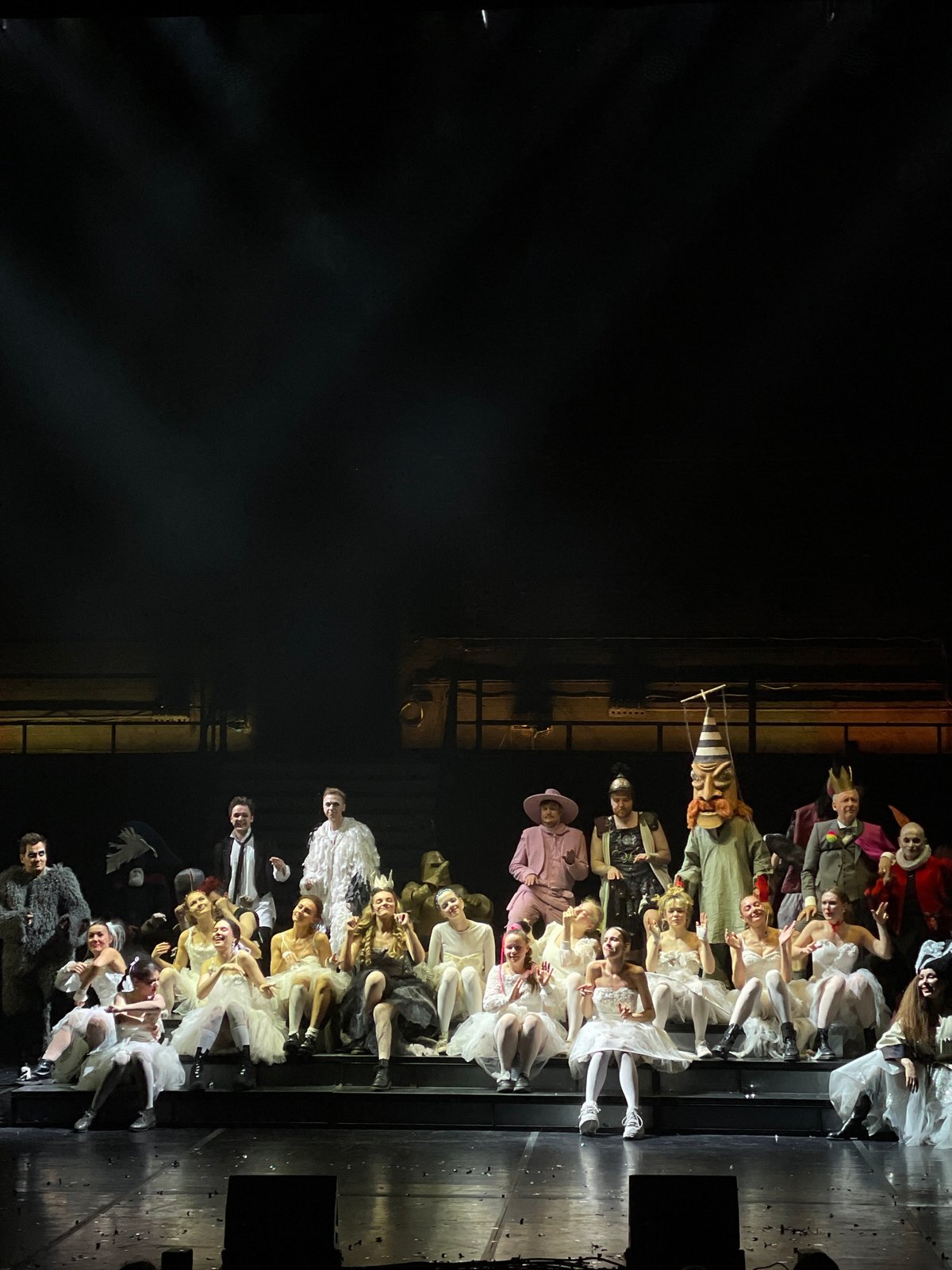 Costumed theatrical performance draws audience to numbered venue