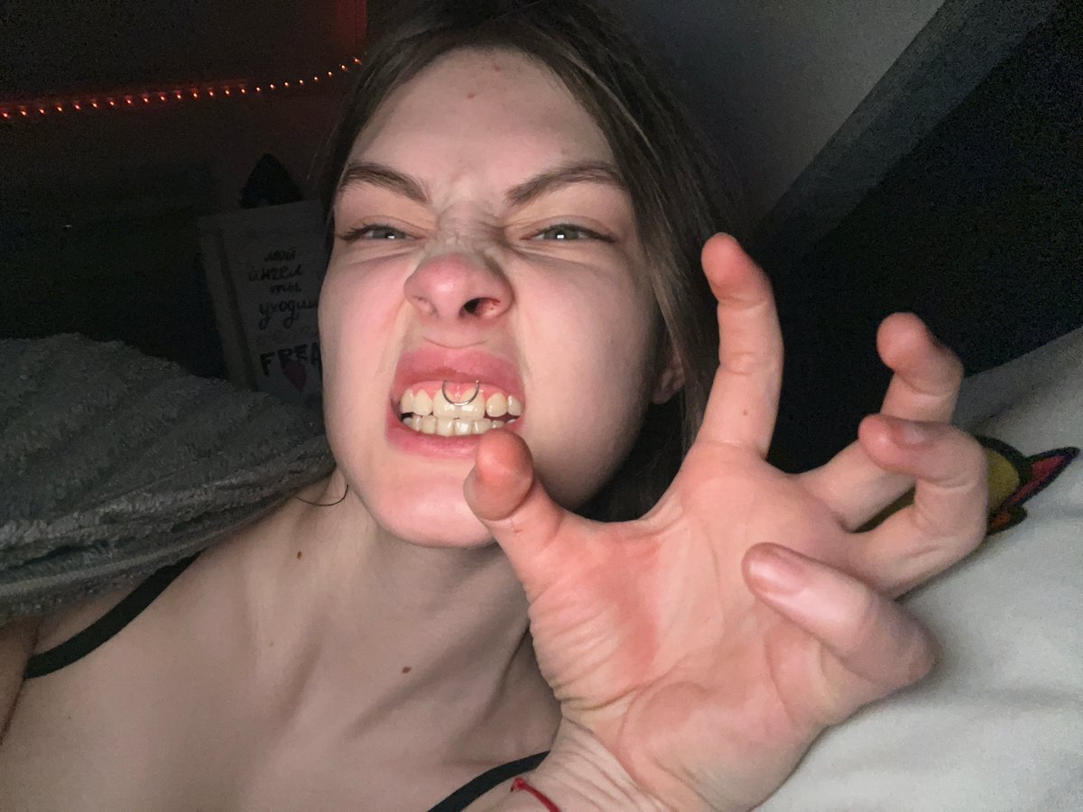 Person captured upside down making claw gesture in Saint Petersburg
