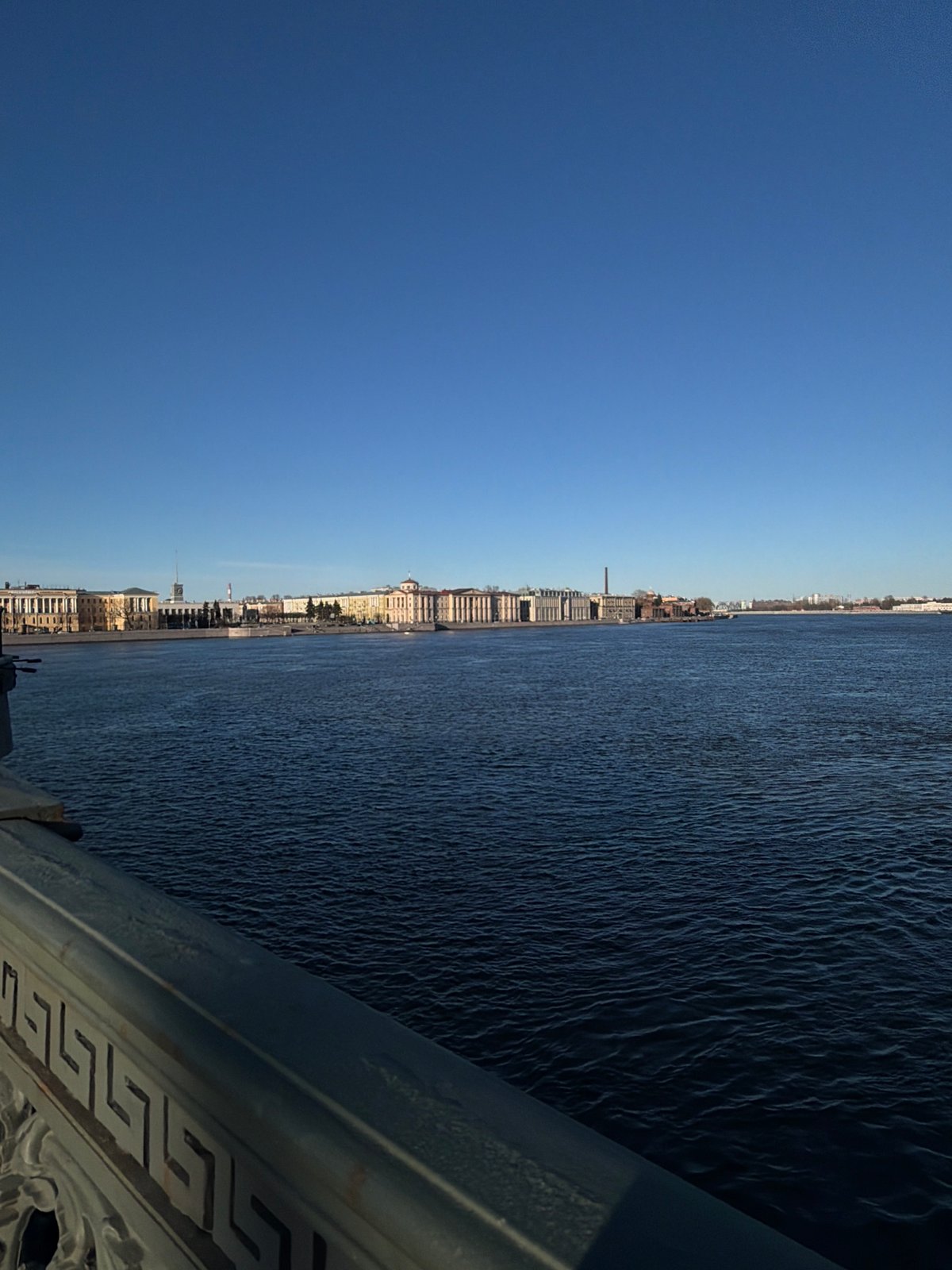 Clear afternoon views captured from Liteyny Bridge over Neva River