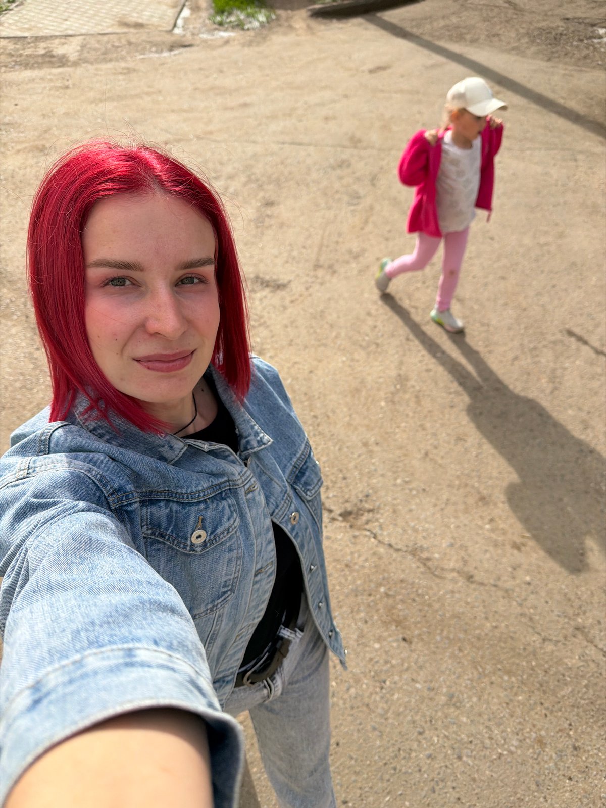 Family gathering with children playing outdoors in Chaikovsky, Russia
