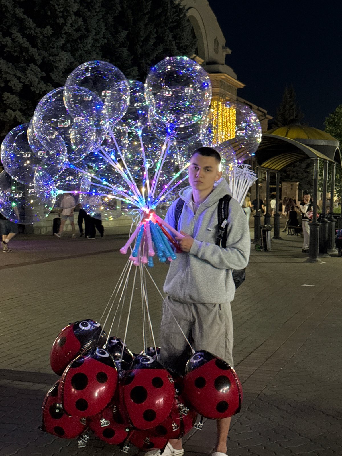 Live music and glowing balloons on Kazan streets at night