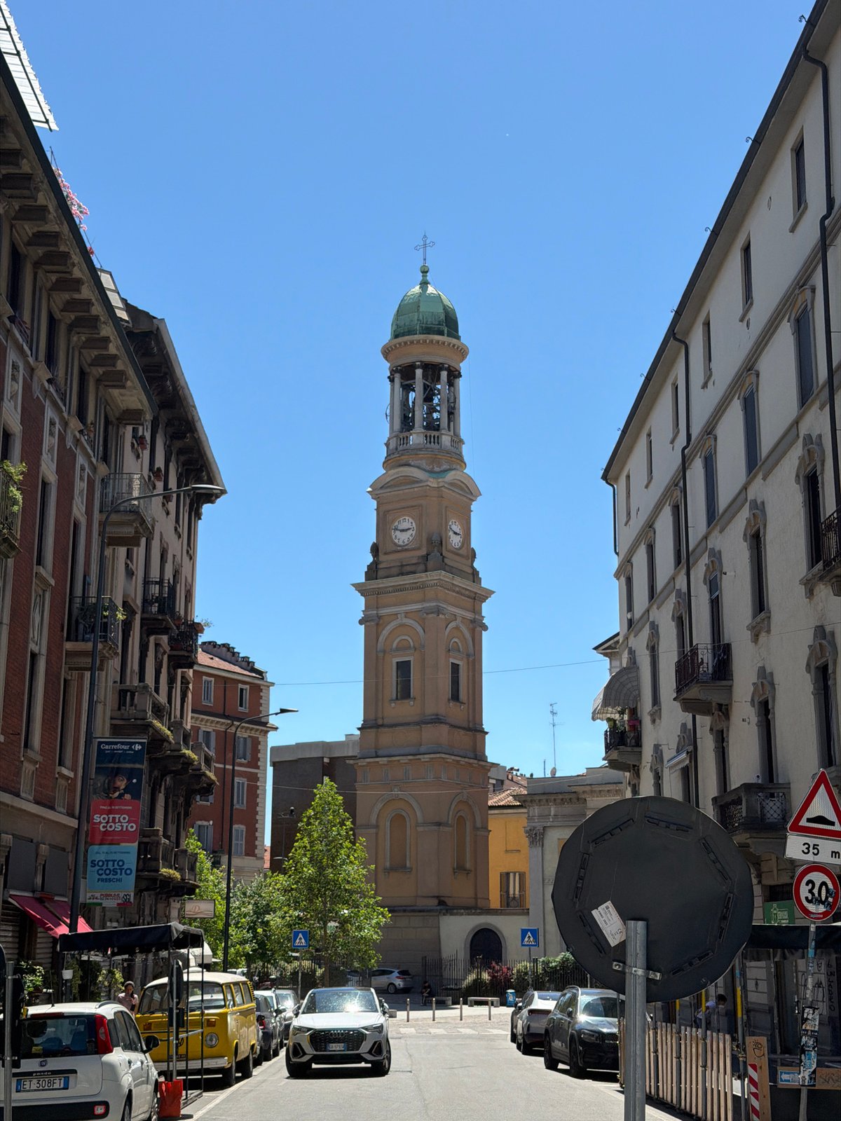 Afternoon street documentation captures Milan's urban landscape and architecture