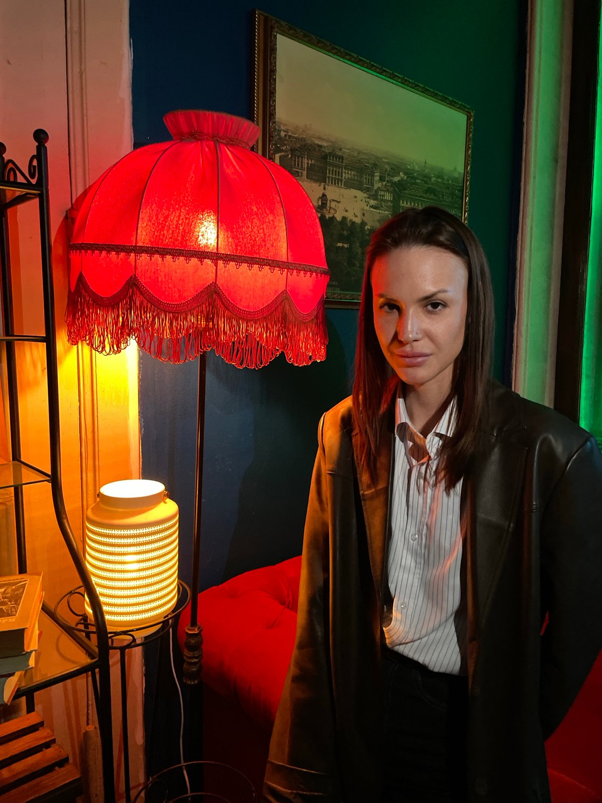 Woman photographed in eclectic interior space in Saint Petersburg