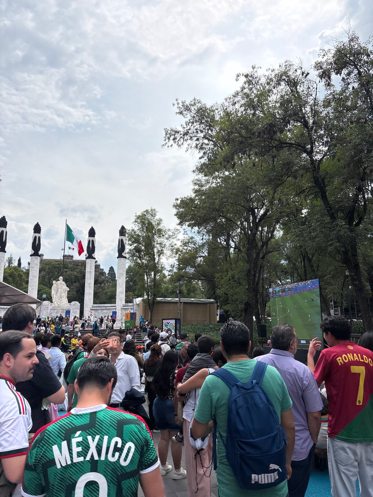 Mexico City crowd watches live soccer at Monument to the Revolution