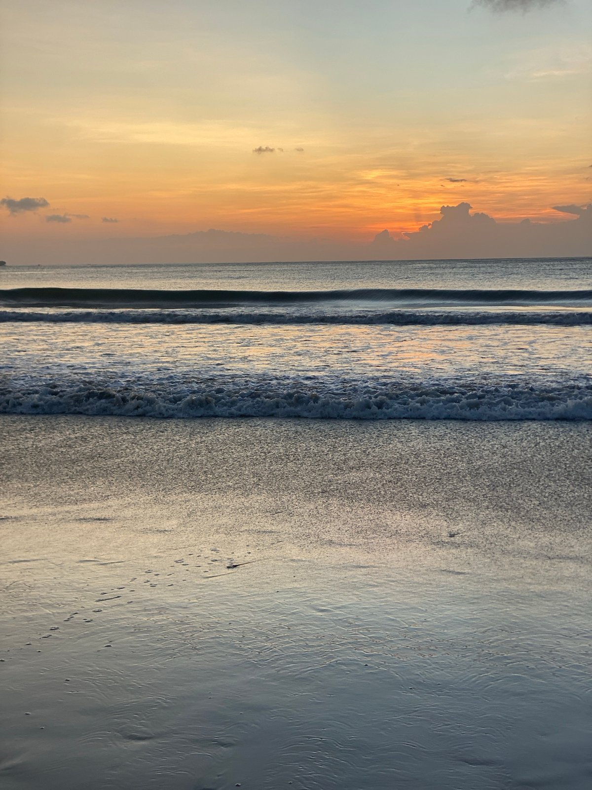 Sunset beach leisure activities captured at Kuta Selatan, Indonesia