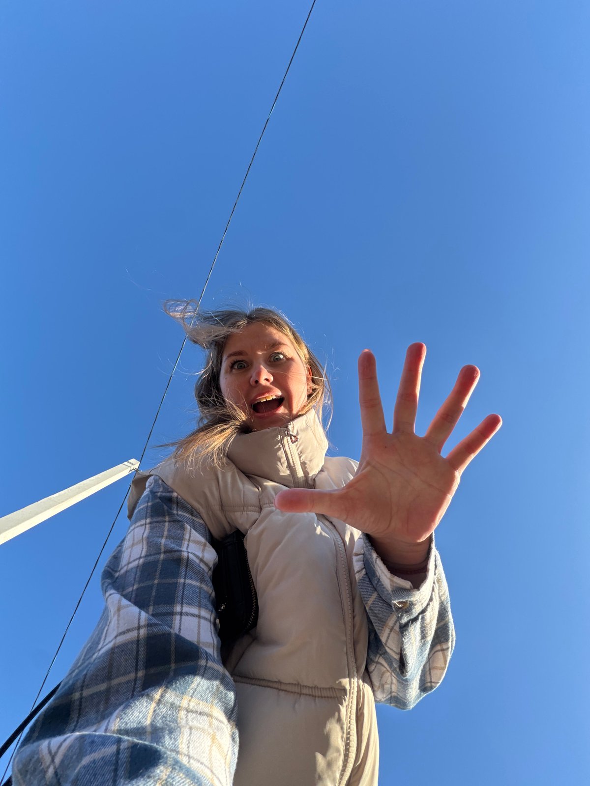 Woman photographed smiling outdoors in Горный, Russia