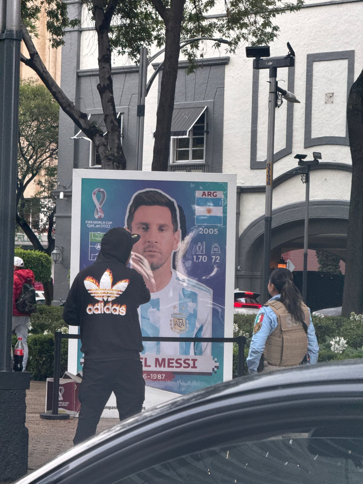 Soccer star posters displayed along Mexico City sidewalks