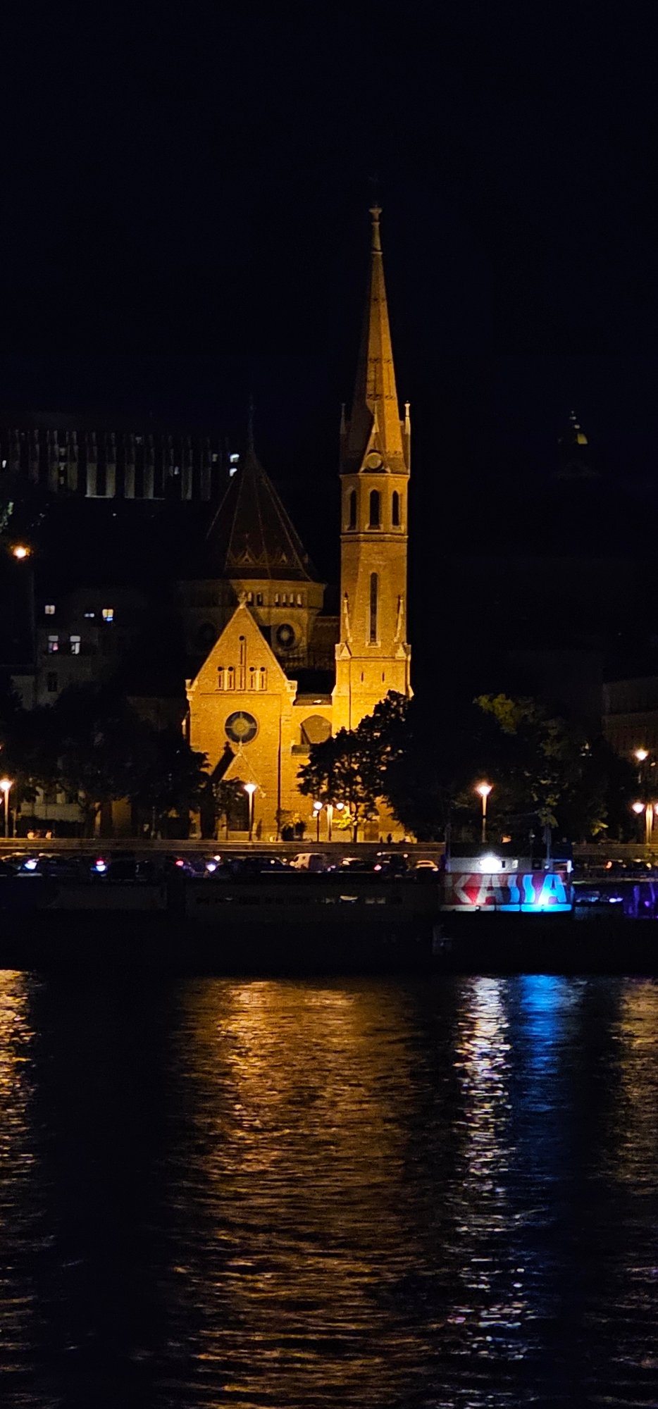 Budapest at night: Parliament, Matthias Church, and the Shoes memorial