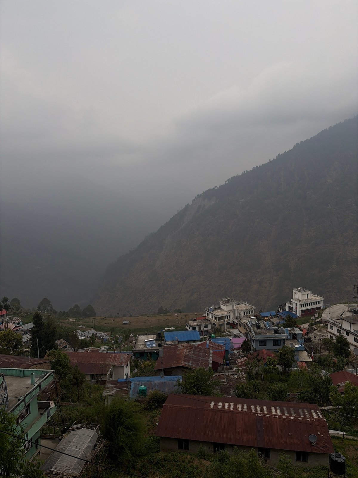 Aerial view captures hillside settlement in Gosaikunda, Nepal
