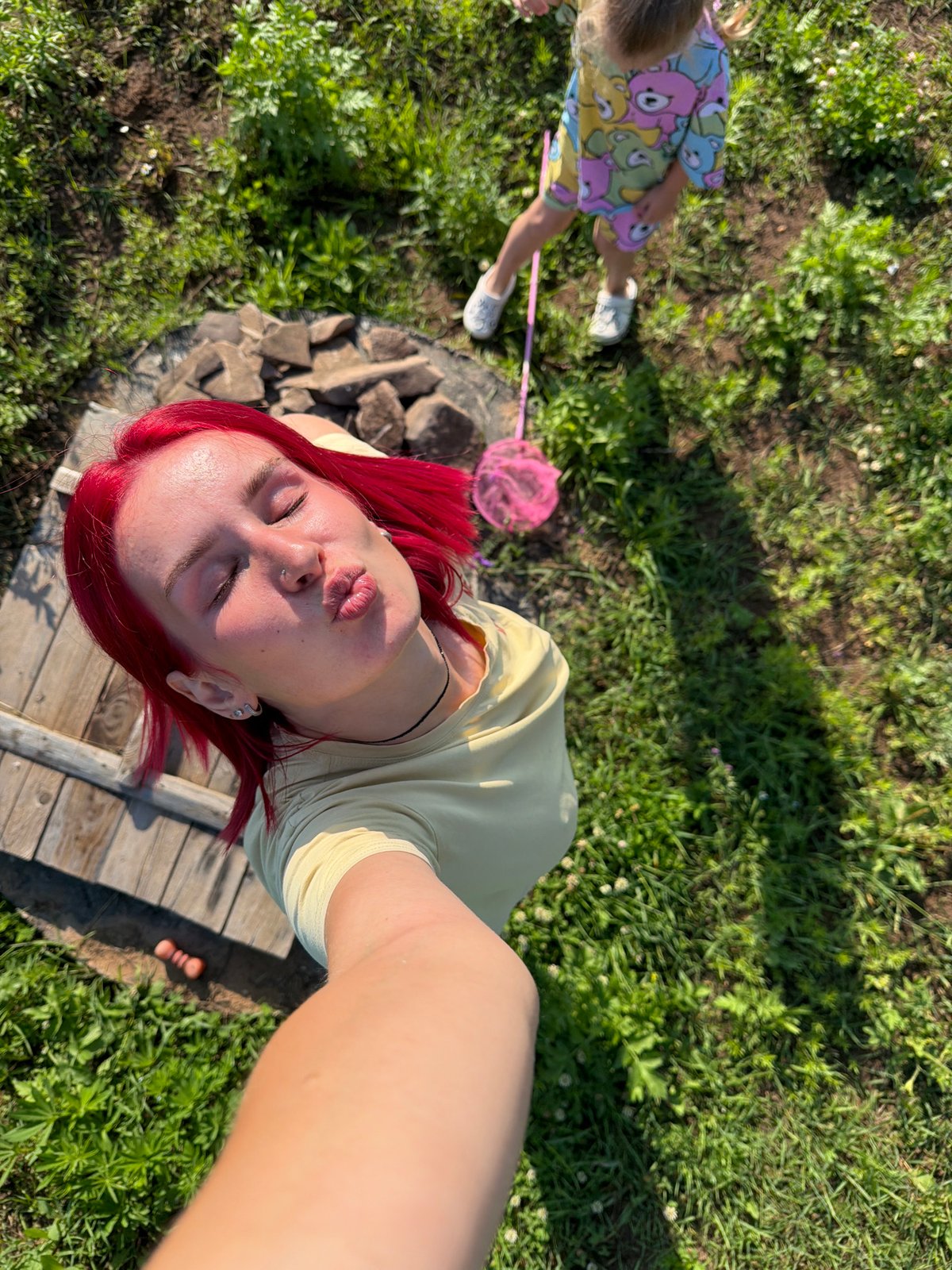 Butterfly hunting and backyard cats on a summer afternoon in Chaikovsky