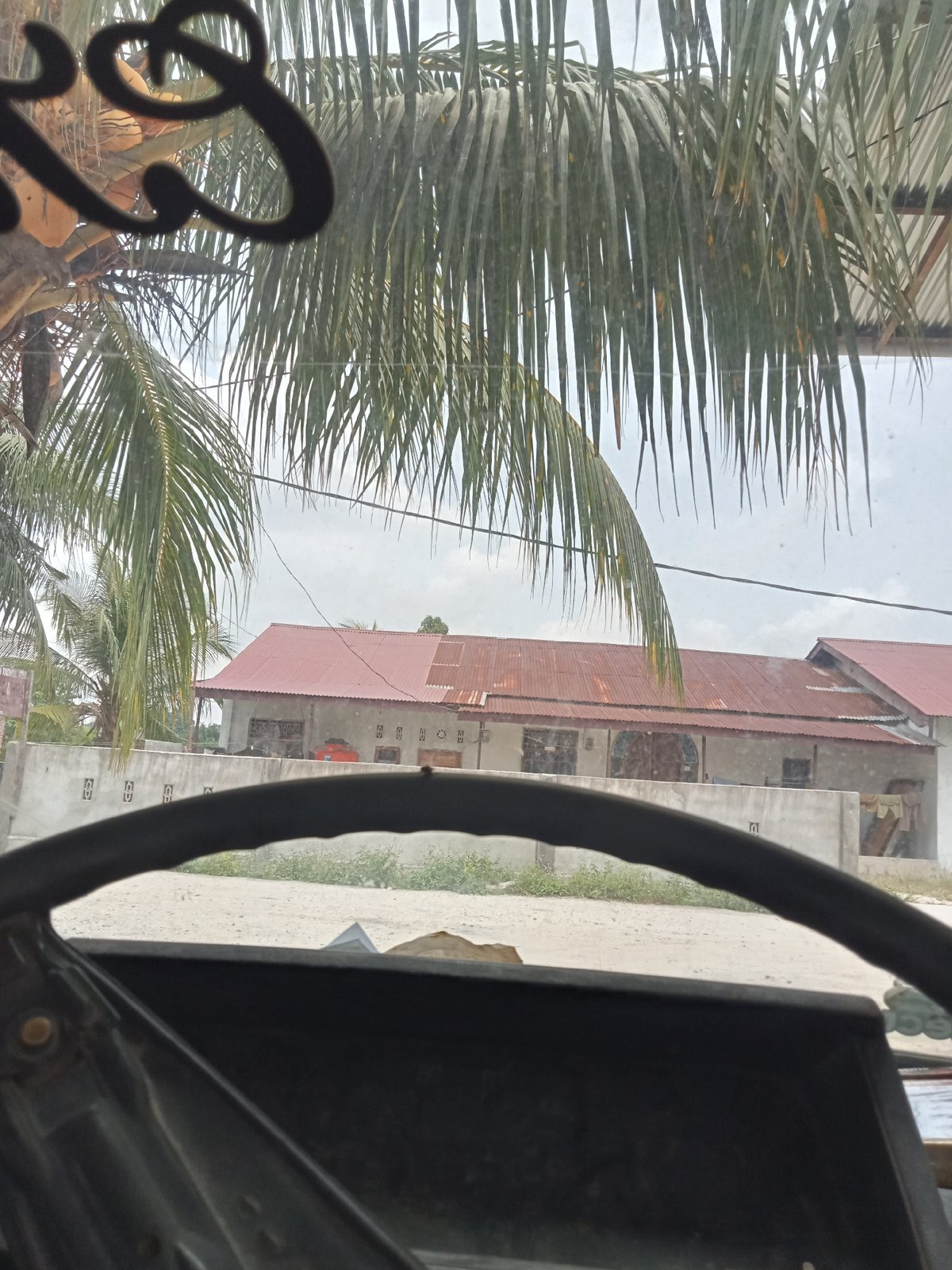 Street-level and rooftop views from Melayu Besar Kota
