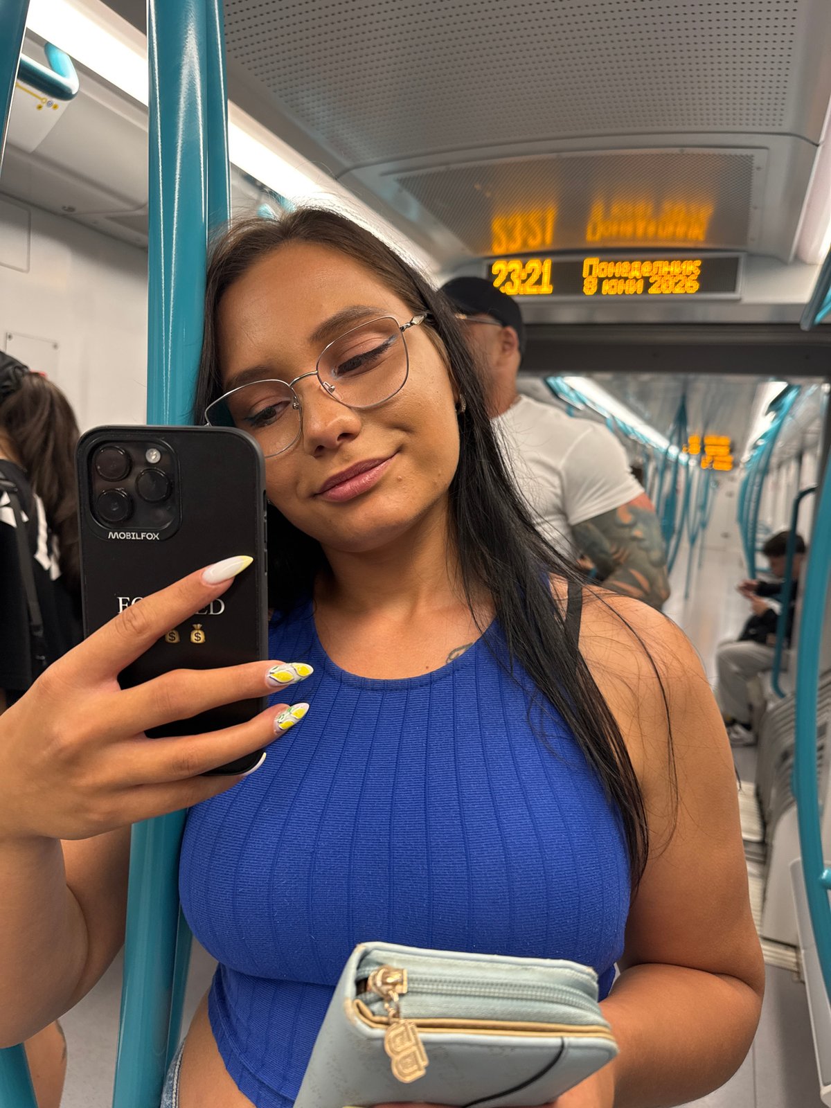 Sofia metro passengers capture selfie moments during evening commute