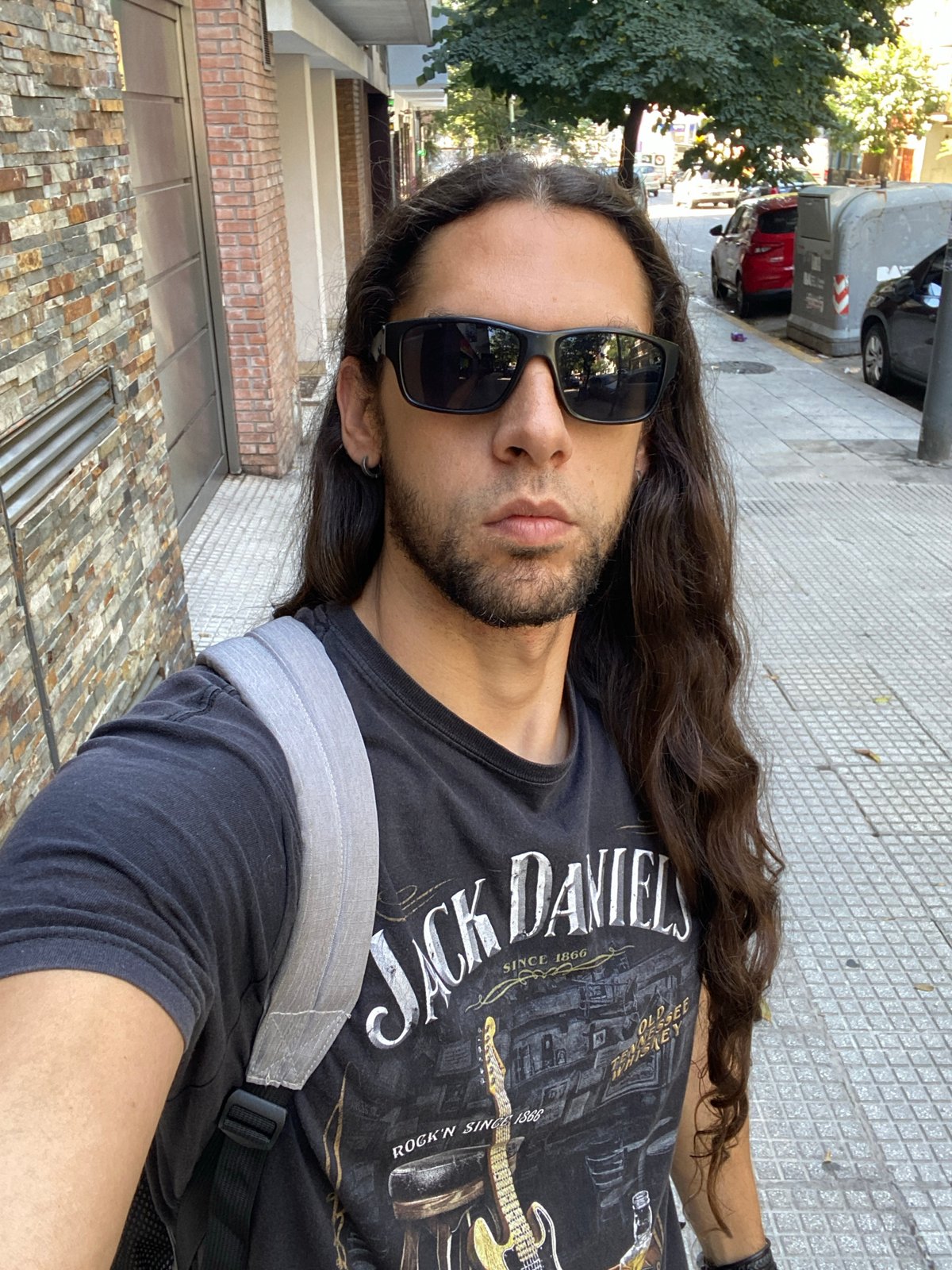 Man takes selfie wearing Jack Daniel's shirt in Buenos Aires