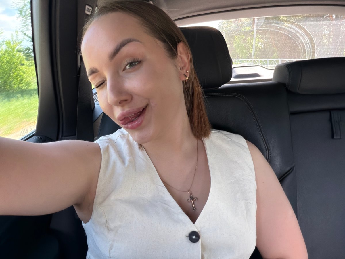 Woman takes playful car selfies in Chaikovsky, Russia